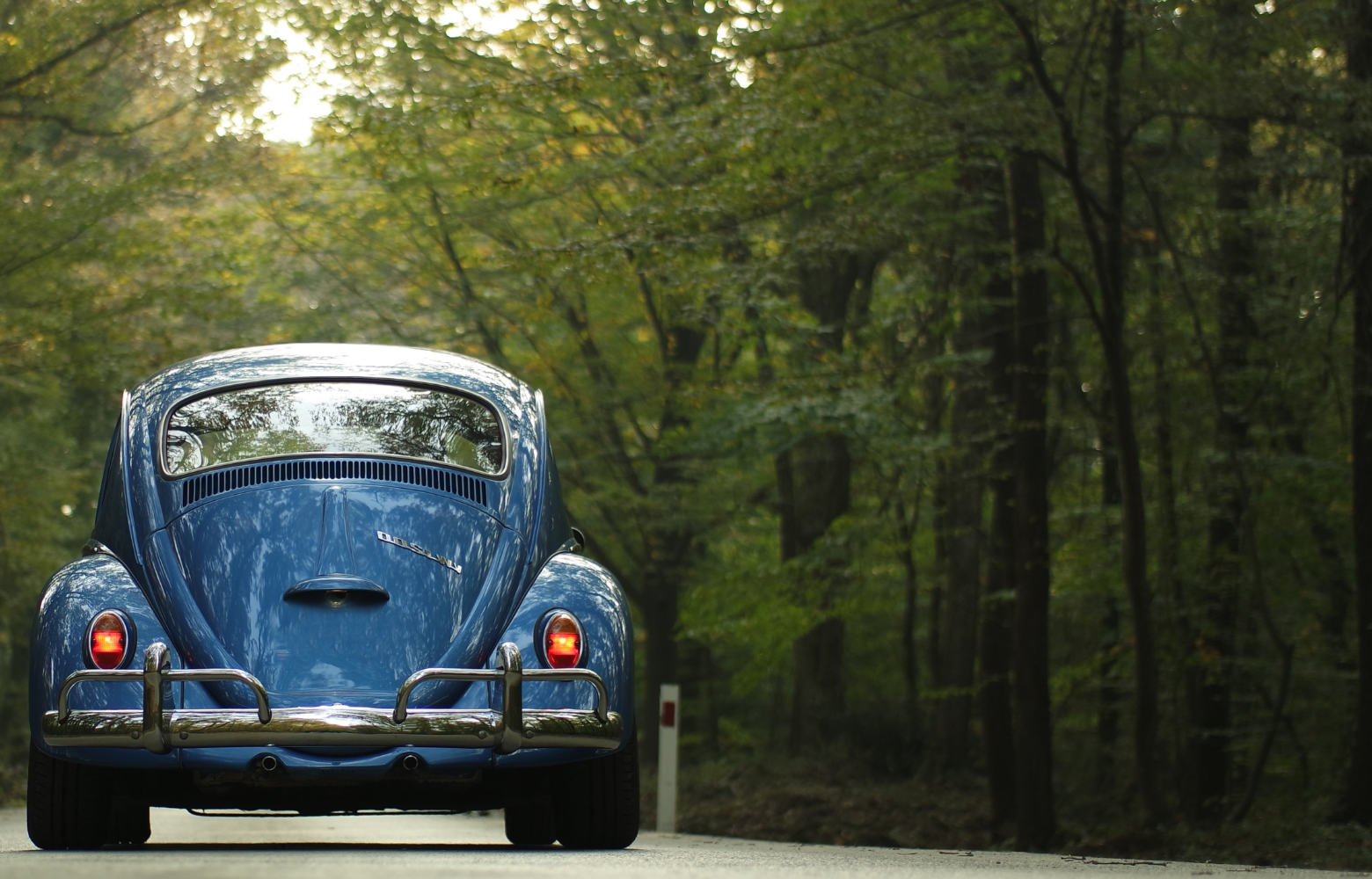 A classic car on display, showcasing its vintage design and timeless automotive craftsmanship at the Cavanaugh Carriages Car Show.