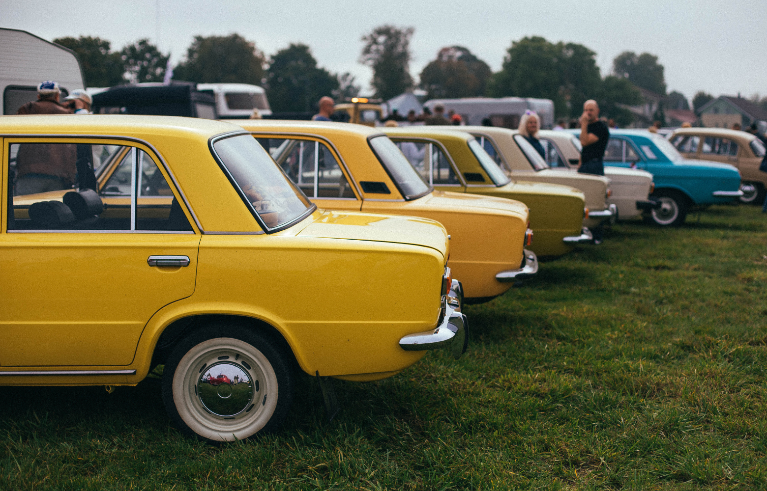 A classic car on display, showcasing its vintage design and timeless automotive craftsmanship at the Cavanaugh Carriages Car Show.