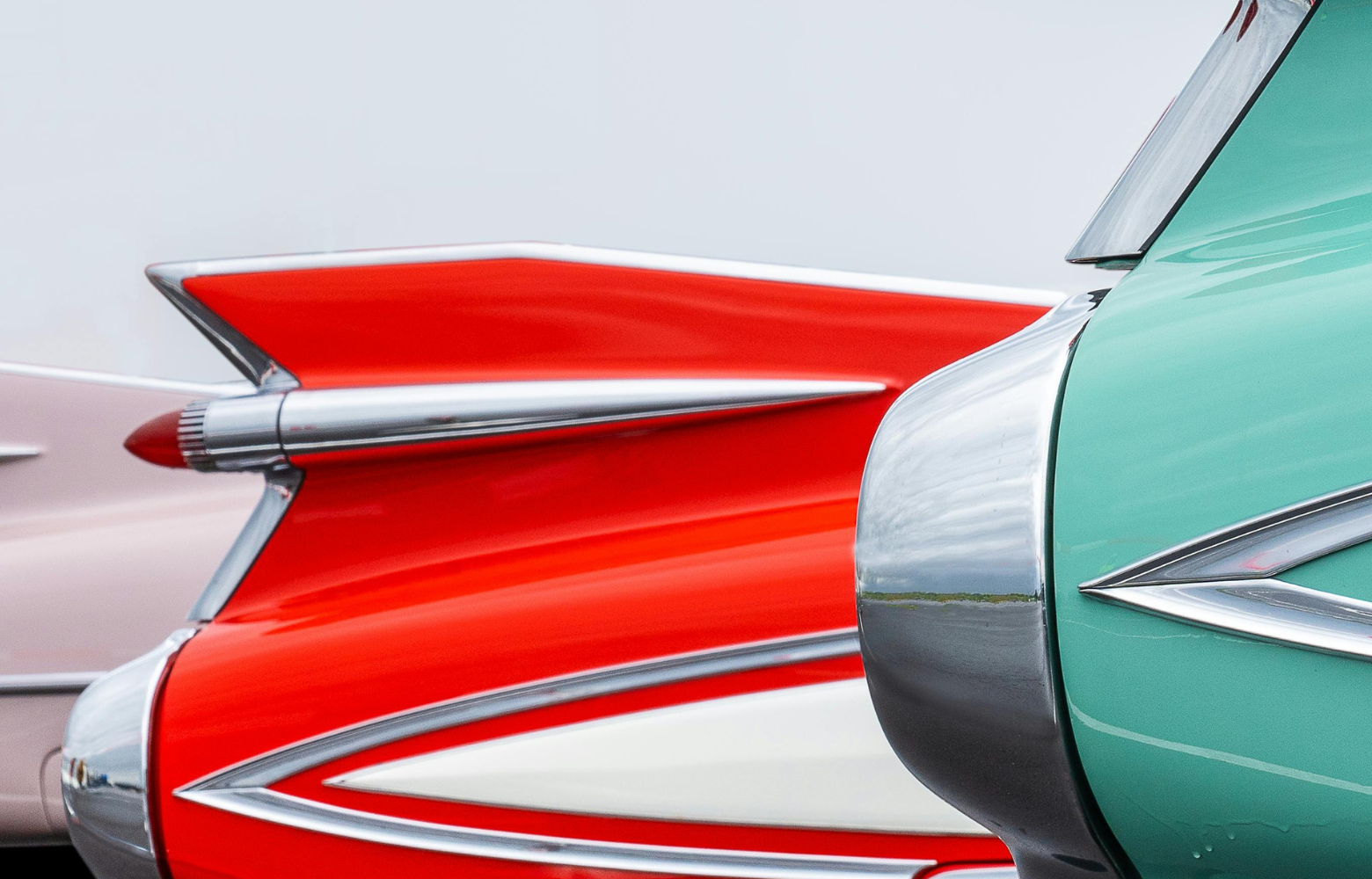 A classic car on display, showcasing its vintage design and timeless automotive craftsmanship at the Cavanaugh Carriages Car Show.