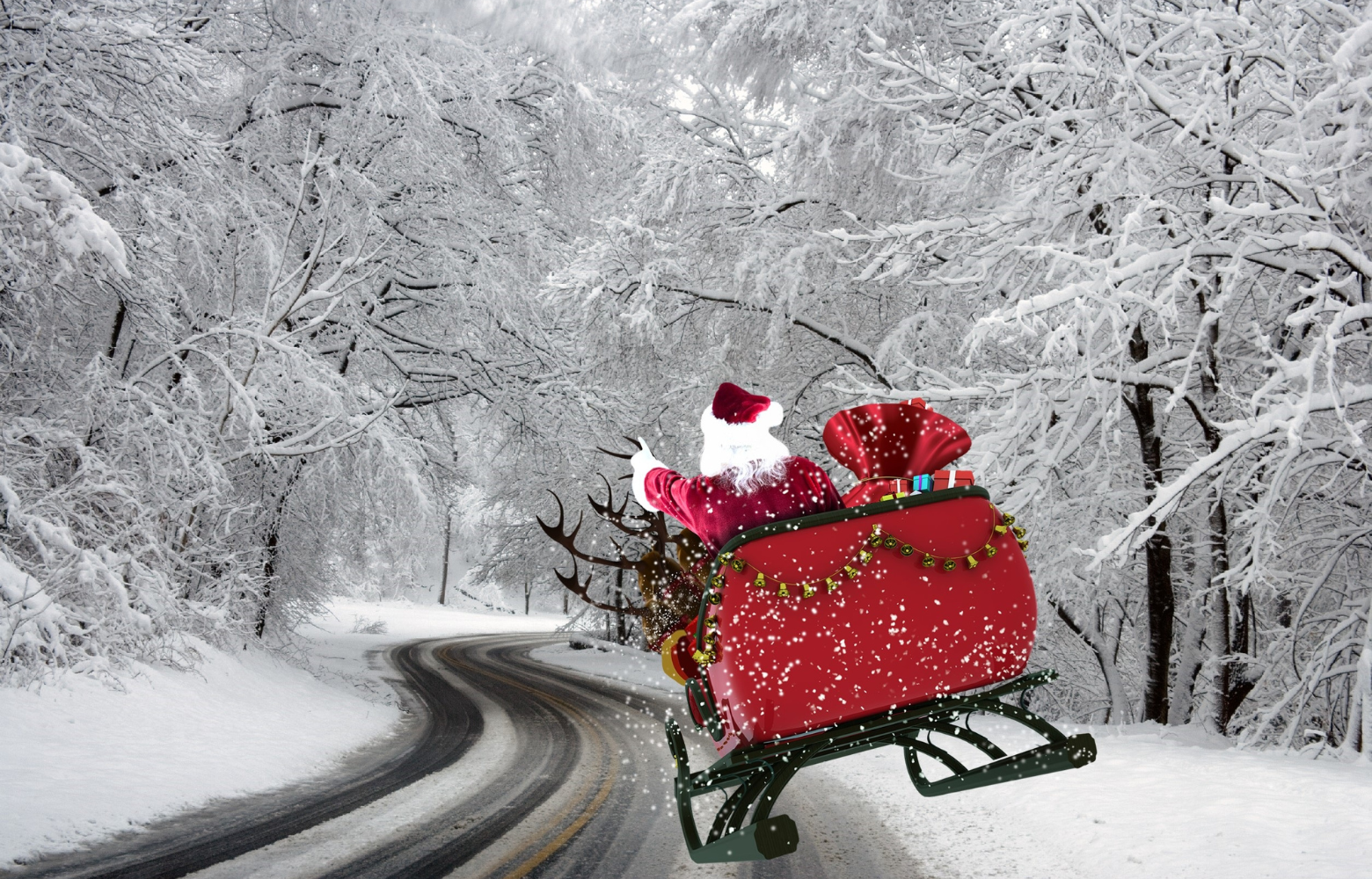 Santa appears to fly his sleigh down a snowy road, bringing holiday magic and festive cheer.