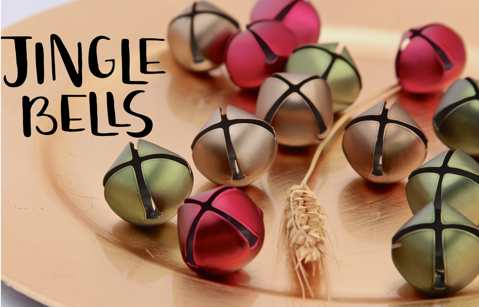 The words 'Jingle Bells' displayed alongside festive bells resting on a plate, evoking holiday cheer and seasonal celebration.